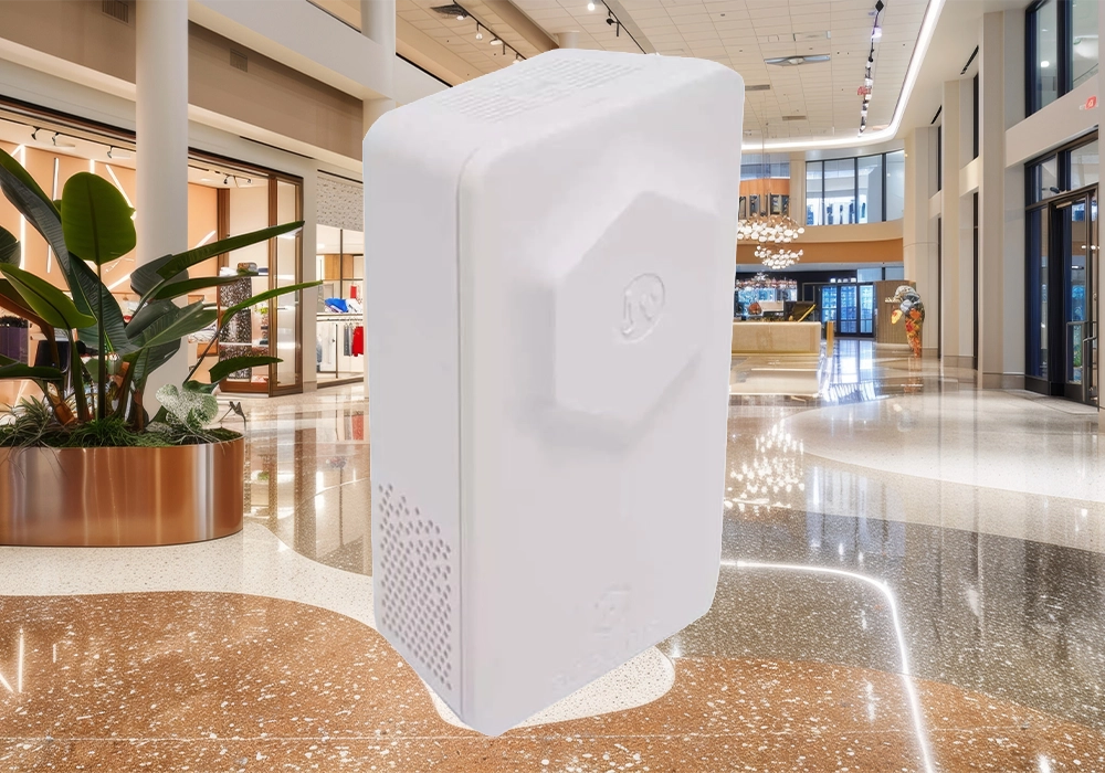 The Adeunis Comfort humidity sensor. The background is a retail shopping centre. The Adeunis Comfort humidity sensor. The background is a retail shopping centre.