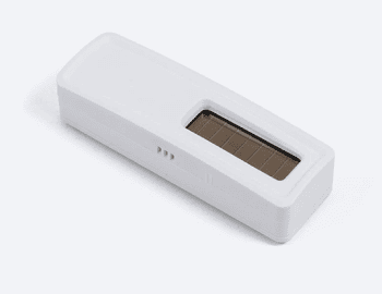 The Enocean temperature humidity sensor appears as a small white brick with a sensor pad on the top.