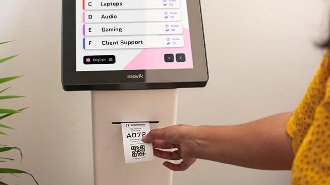 Queueing iosk used by customers to manage queues efficiently in retail or banking environments. Queueing iosk used by customers to manage queues efficiently in retail or banking environments.