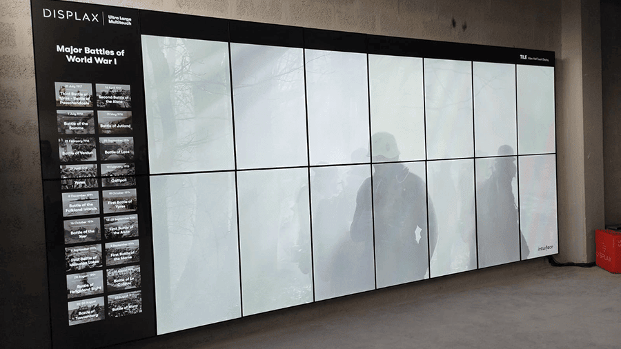 Close-up of the TILE Pro video wall showing seamless bezel alignment and bright display in a museum.