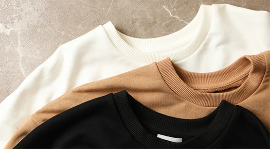 close up of sweatshirts in three colours