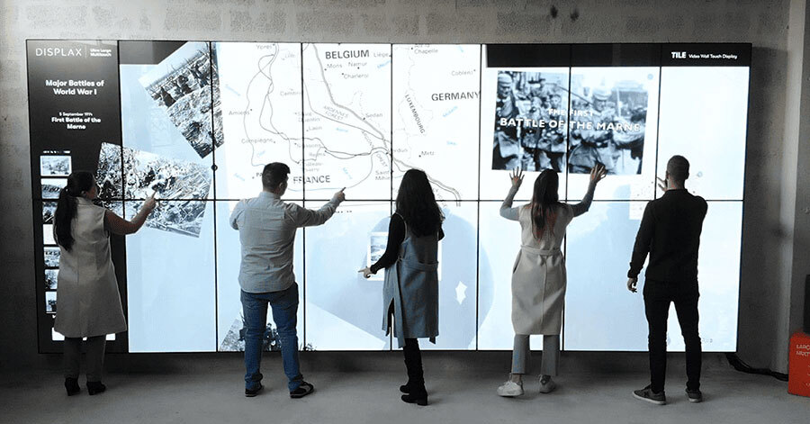 "DISPLAX TILE Pro configured as an 8x2 interactive video wall installation. "DISPLAX TILE Pro configured as an 8x2 interactive video wall installation.