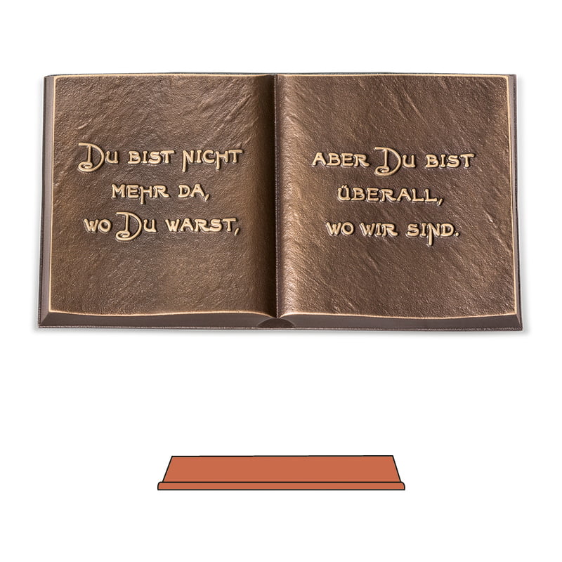 Bronzen boek met tekst Bronzen boek met tekst