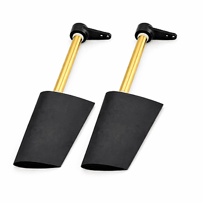 Undermounted RC boat rudders with black blades, brass tubes, and single lever control arms
