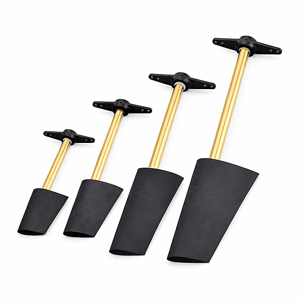 Undermounted RC boat rudders with black blades, brass tubes, and 180-degree control arms Undermounted RC boat rudders with black blades, brass tubes, and 180-degree control arms