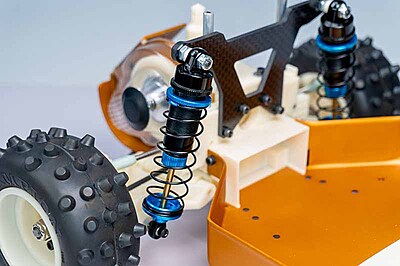 Koswork AE RC10 Big Bore 12mm Buggy Shock Set (F&R) (4) Blue Koswork AE RC10 Big Bore 12mm Buggy Shock Set (F&R) (4) Blue